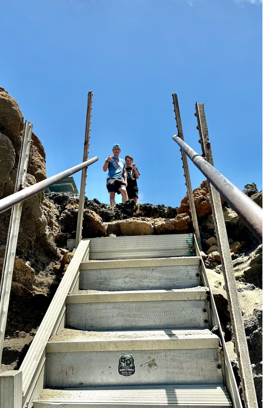 Rickety stairs leading down to Papakōlea Beach