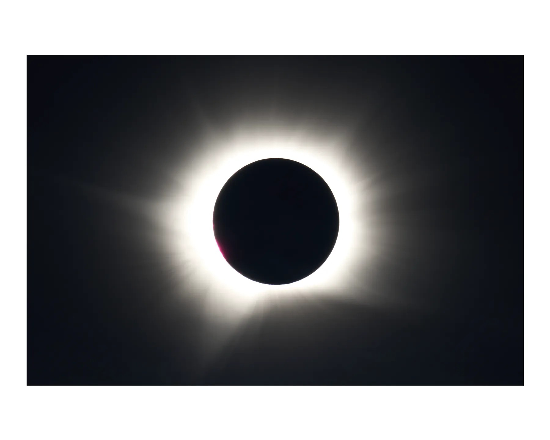 The sun's corona flaring just before totality